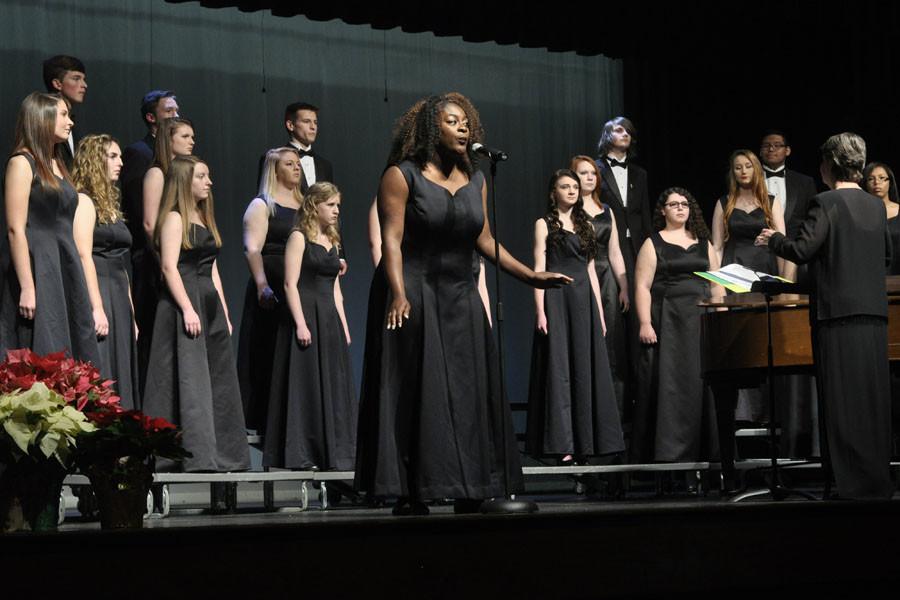 Jade Brown leads the choir in a solo of Bonse Aba, a song written by Arr. Andrew Fischer. Brown is a member of advanced choir. 