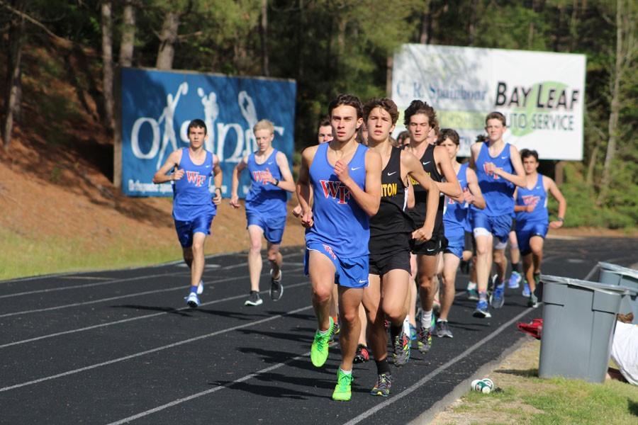 Senior Bailey Autry leads the pack against Broughton. This photo is not from the Wake County track meet.