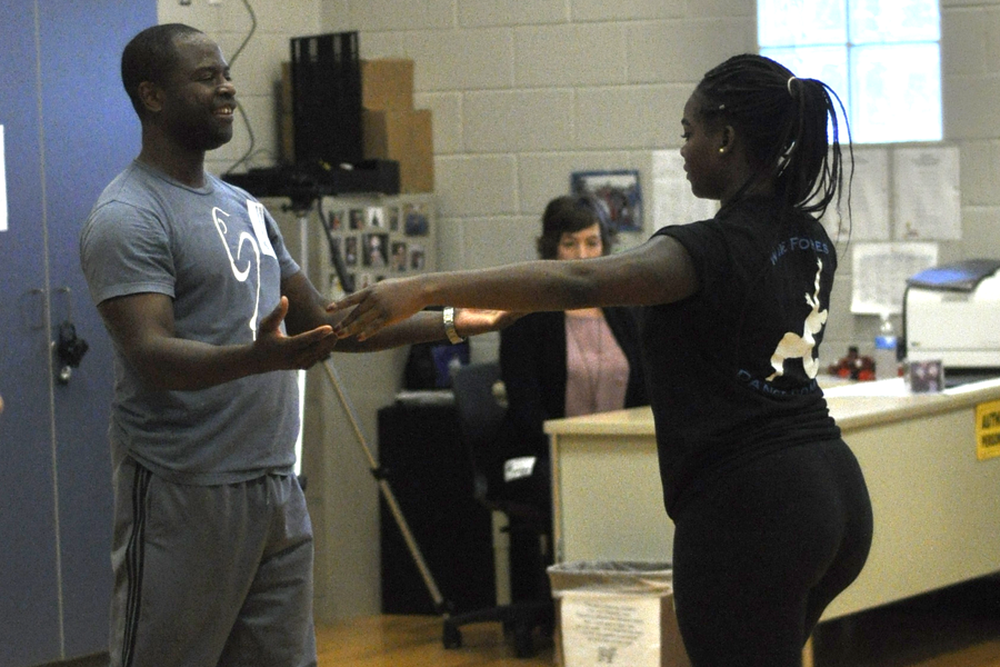 Dance instructor Gaspard Louis visited Sherri Newhouse’s classes and taught students weight sharing techniques.