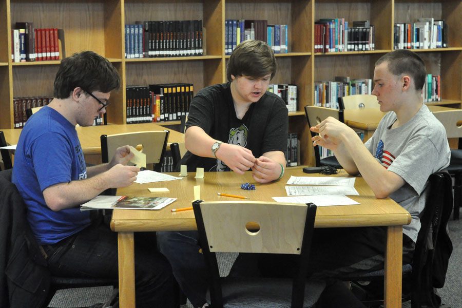 Freshmen Kevin Jewell and James Vasilko play Dungeons and Dragons.