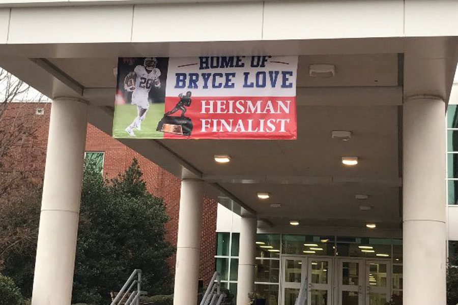 A+banner+at+the+entrance+of+the+school+displays+the+pride+the+Cougars+have+for+graduate+Bryce+Love