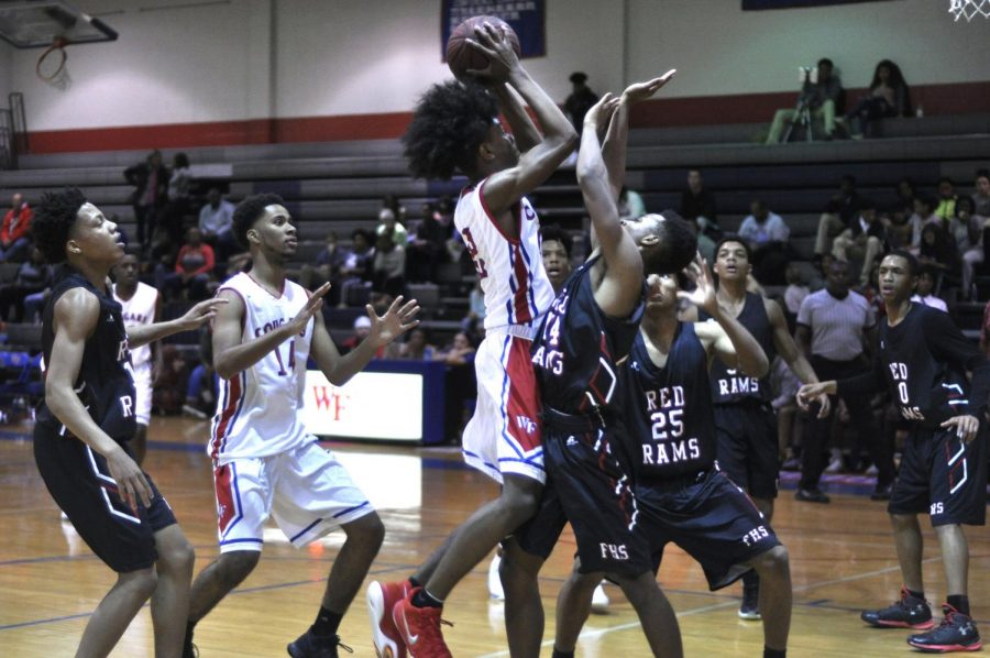 The Cougars face off against Franklinton high Dec. 13. The team clinched a victory in overtime. 