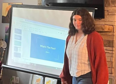 Emma Briceno (pictured) presents to peers one of many presentations she created on the First Amendment.